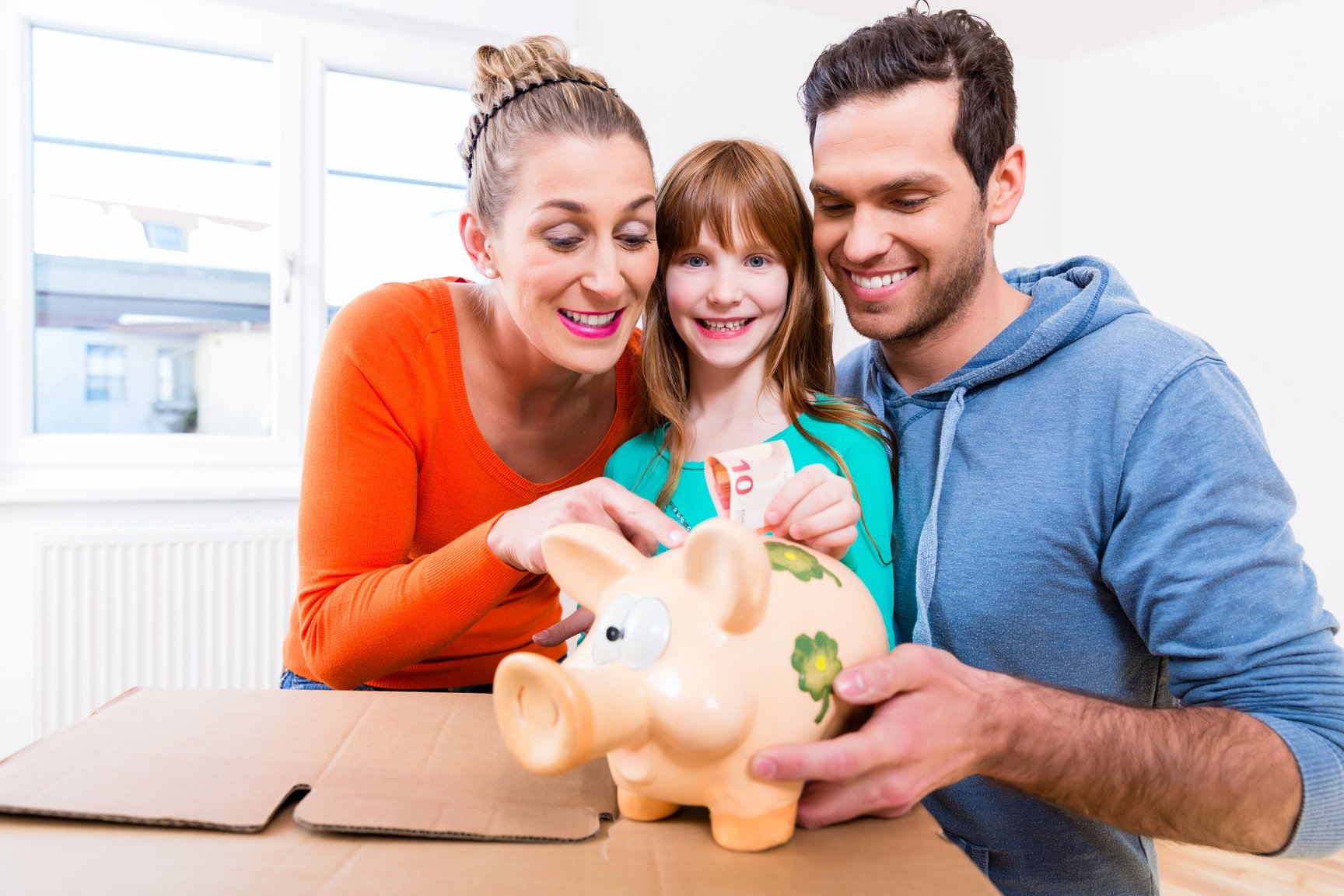 Family Saving Money by Moving House