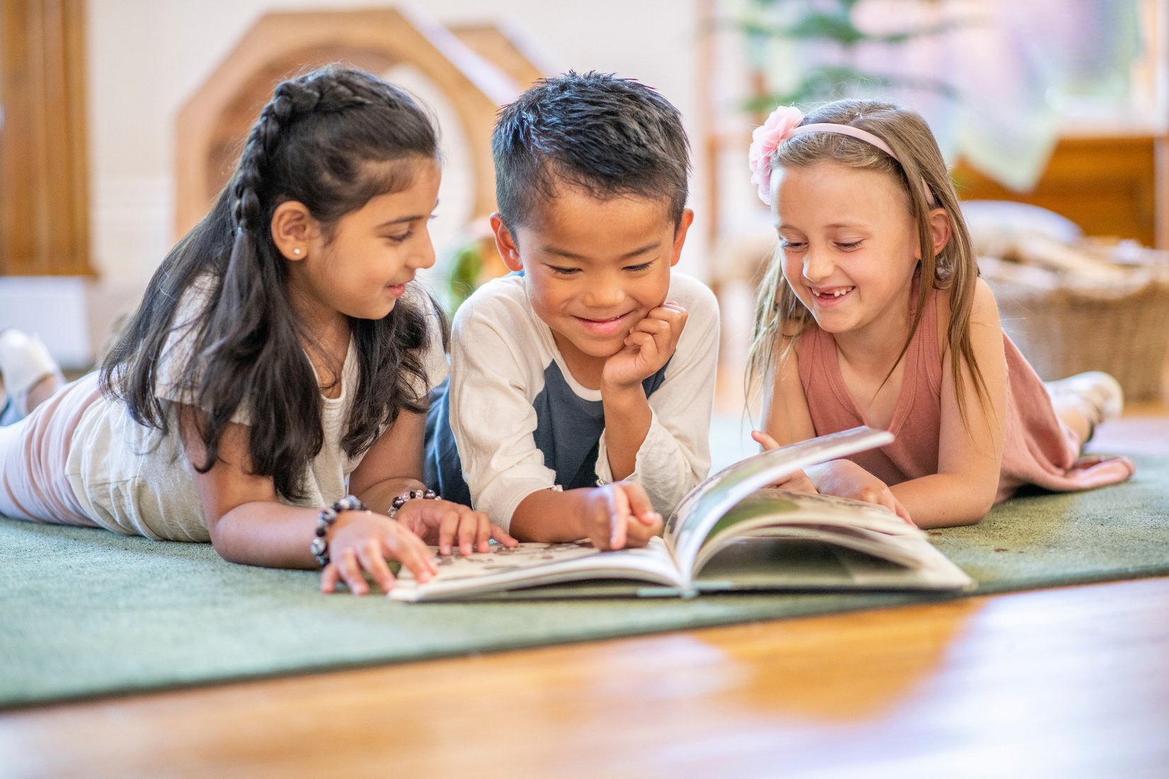 Kids reading on the floor